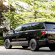 Illustration for article titled Only When The Extended-Length Lincoln Navigator Is 50 Feet Long Will America Return To Greatness